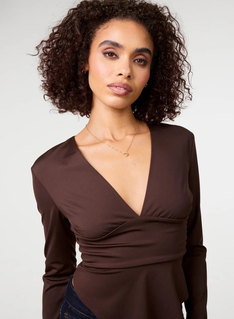 Stretch V Neck Hanky Hem Top
