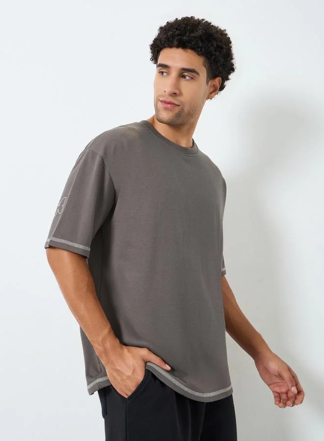 ستايلي تيشيرت واسع مطبع بكتابة