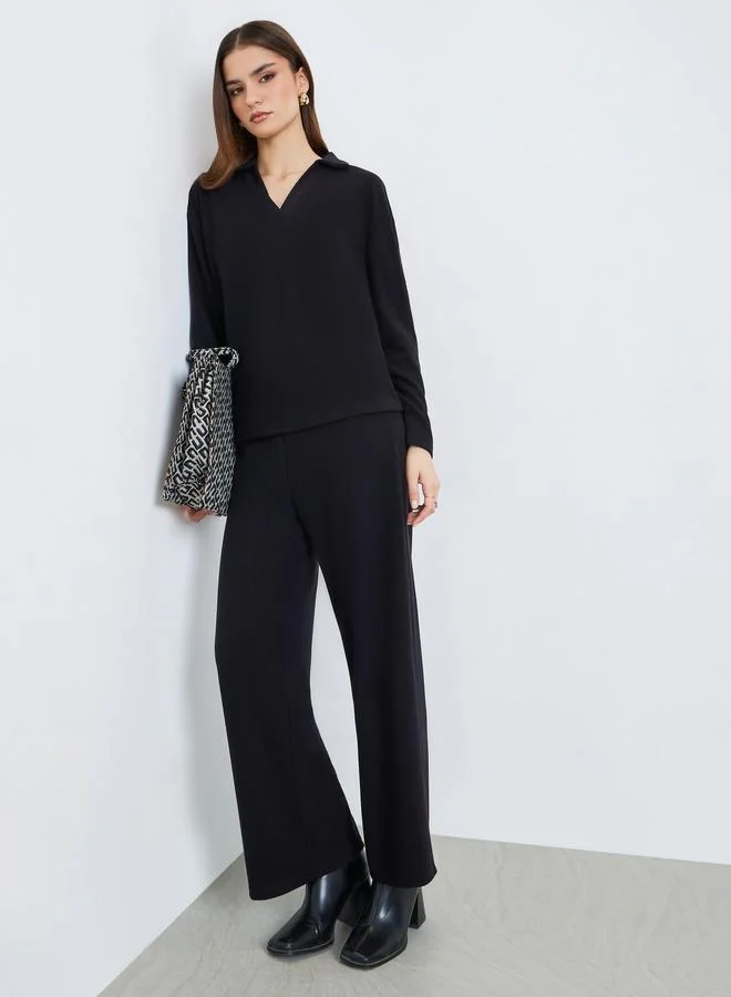 ستايلي طقم منسق من بلوزة بياقة مفتوحة بتفاصيل محبوكة وبنطال