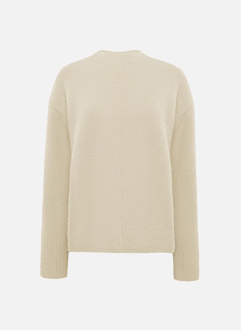 ليتشي سترة محبوكة ذات ملمس مميز مع تفاصيل مضلعة