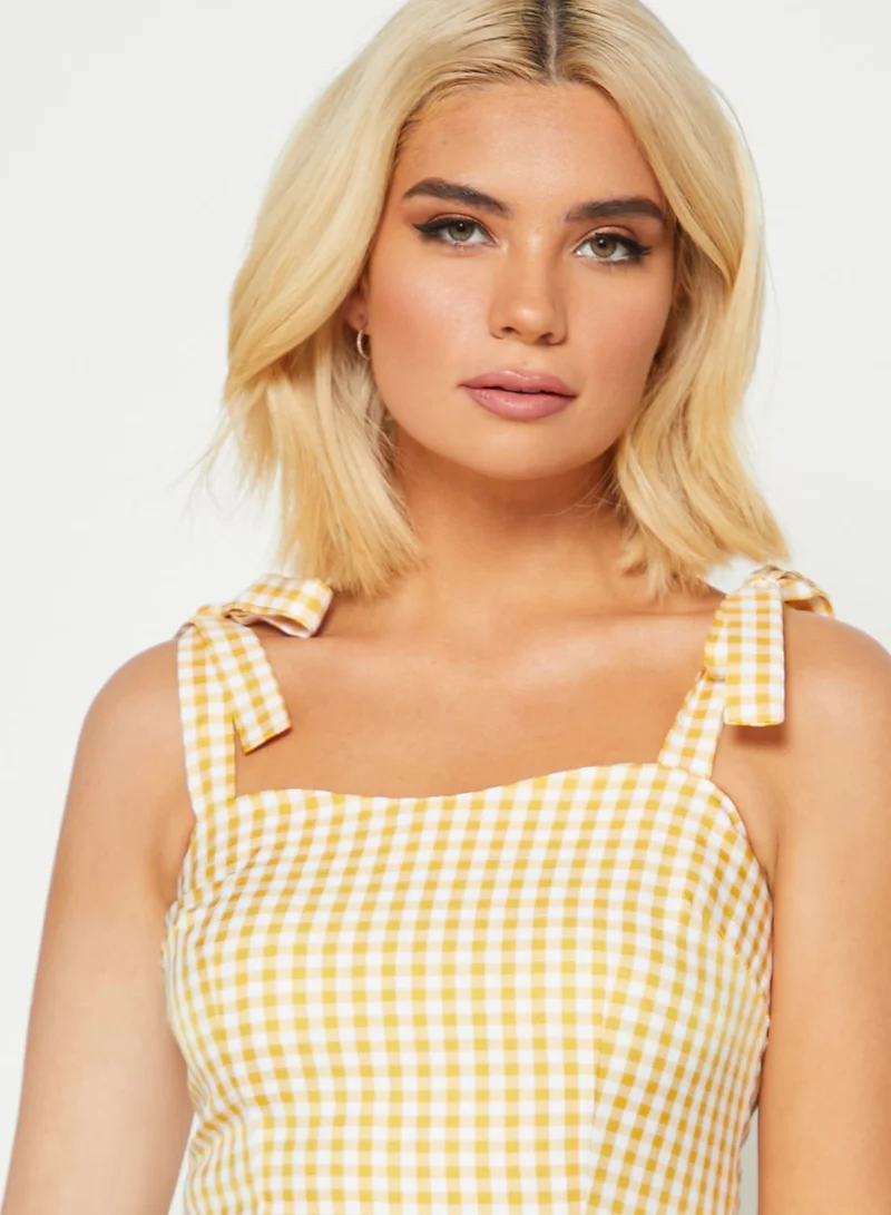 Ginger Checked Ruffle Peplum Top