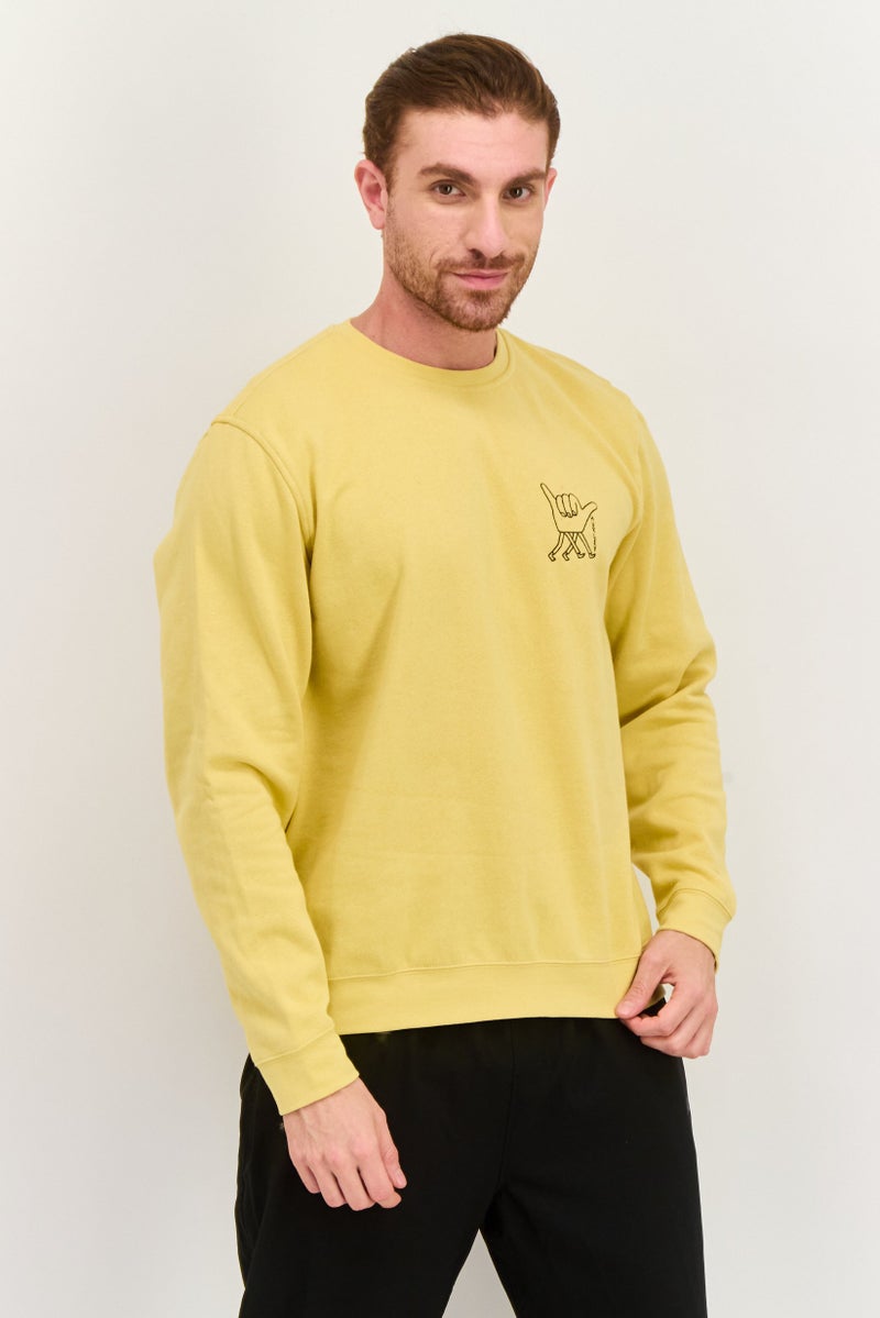 Hurley سويت شيرت رجالي بأكمام طويلة وياقة دائرية مزخرفة، أصفر - Image 1