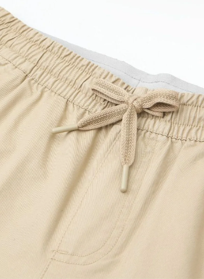Giordano  Men's Slim Peach Twill Elastic Shorts for Men | Best Price UAE