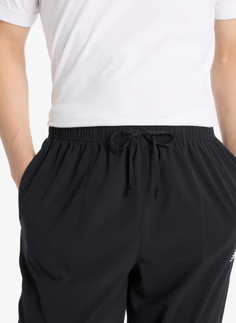 نيو بالانس سراويل منسوجة أساسية - Image 5