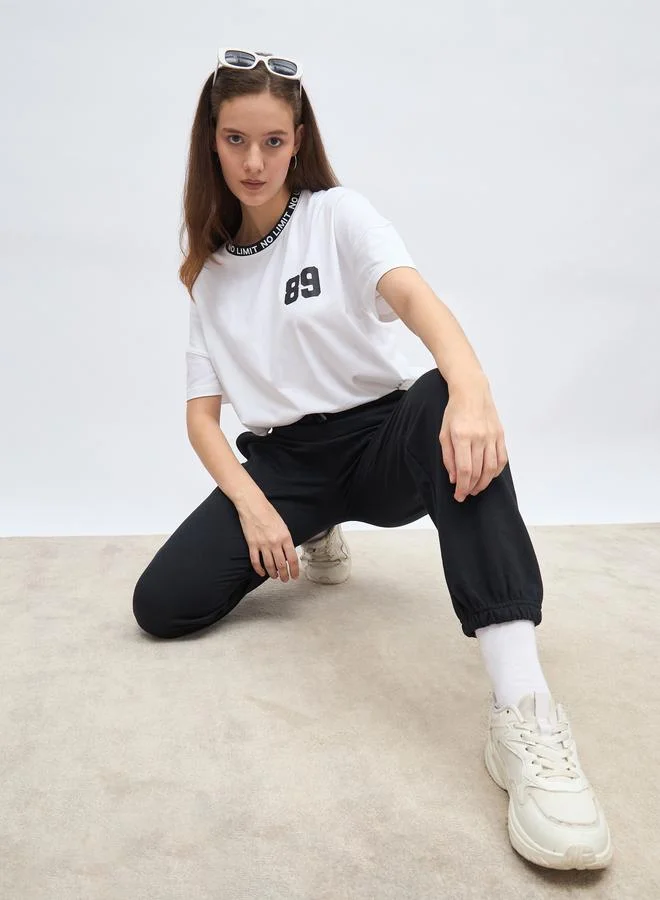 ستايلي Styli Oversized Slogan T-Shirt and Cuffed Joggers Set