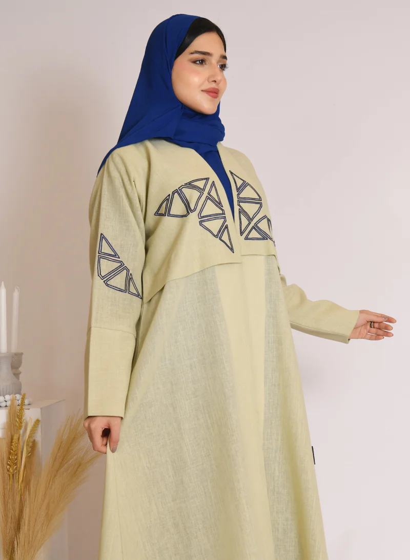 HAWRAA ABAYA Light green wrap abaya with blue embroidery