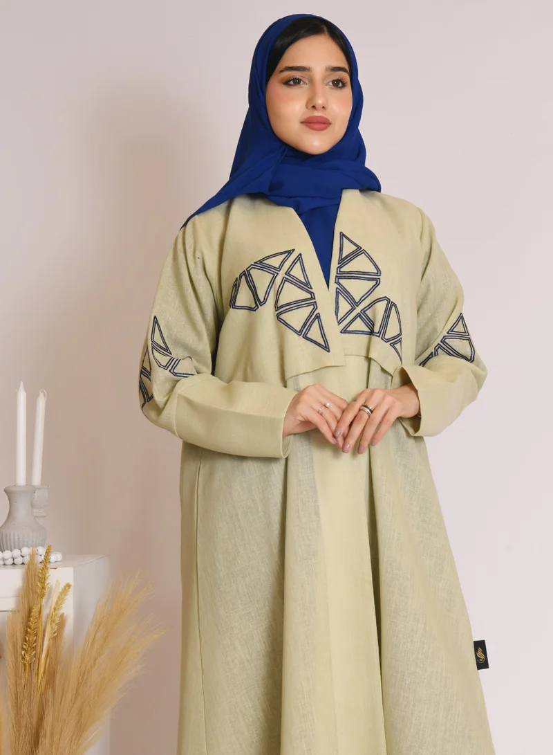 HAWRAA ABAYA Light green wrap abaya with blue embroidery