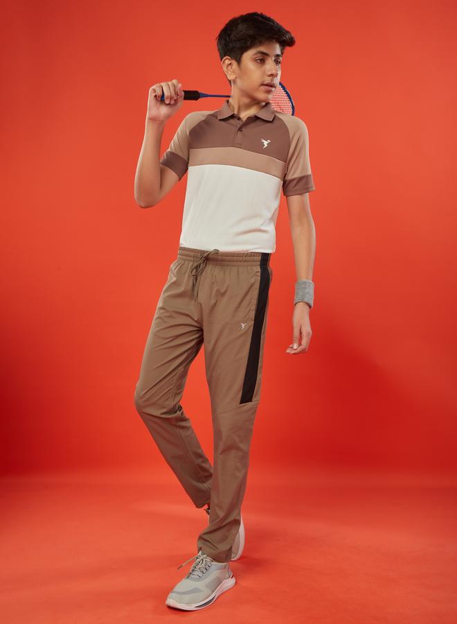 تكنوسبورت بنطلون رياضي للأولاد بتصميم عصري بخصر متباين وقصة ضيقة - Image 1