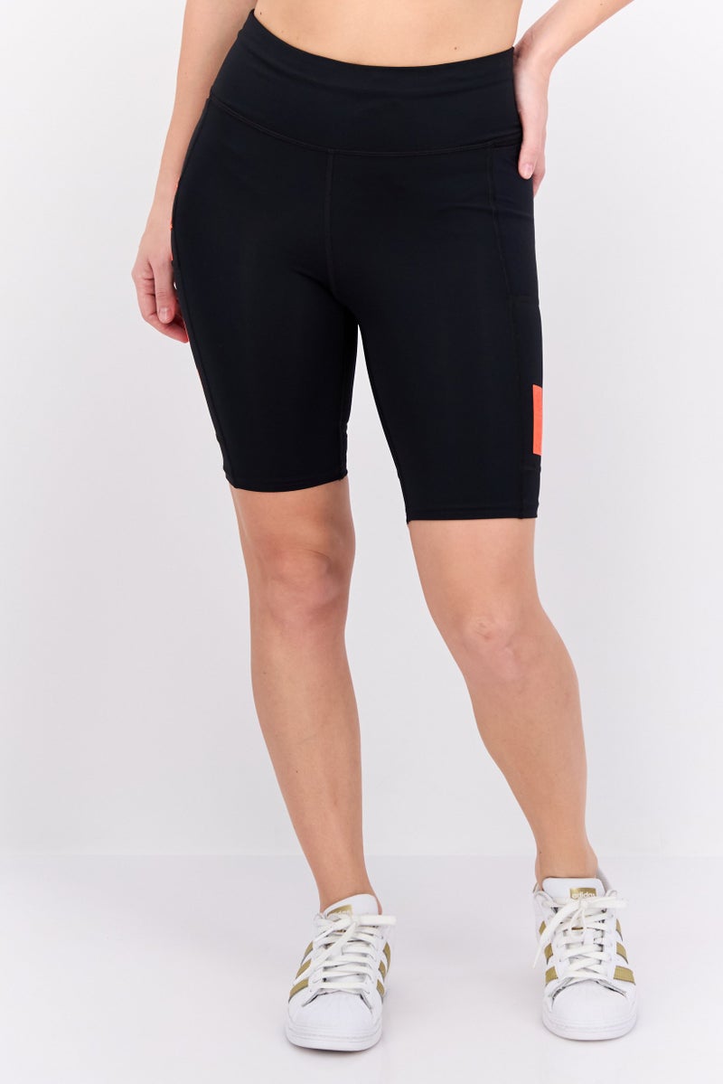 UNDER ARMOUR شورتات تدريب رياضية للنساء بشعار العلامة التجارية، أسود - Image 1