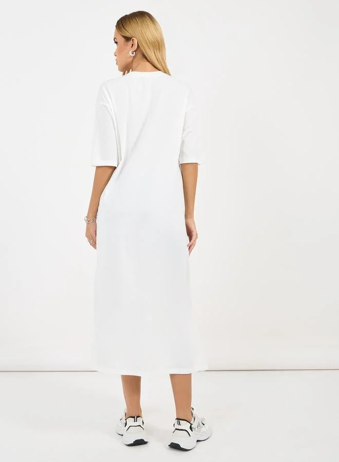 Styli Solid Round Neck Longline T-Shirt with Side Slit