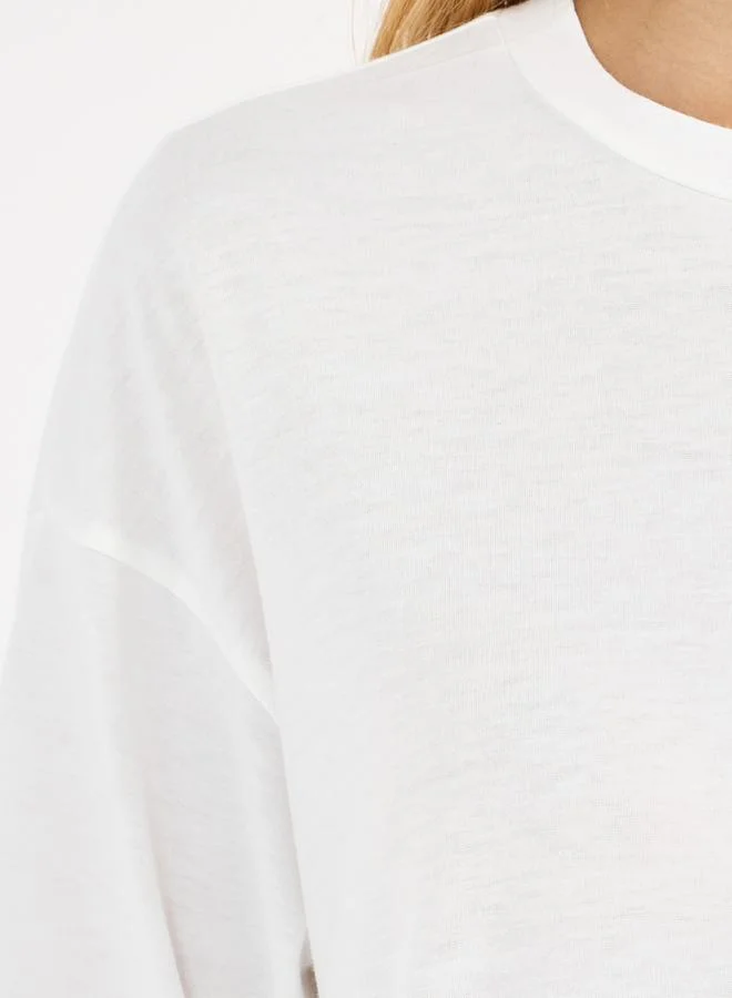 Styli Solid Round Neck Longline T-Shirt with Side Slit