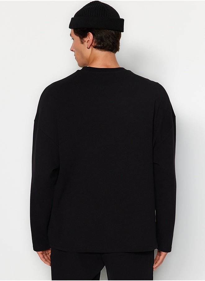 trendyol Black Oversize/Wide Cut Limited Edition Textured Label Detailed Sweatshirt TMNAW24SW00073  - Image 5