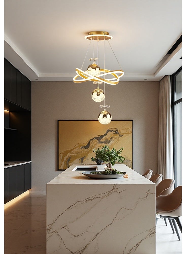 A fashionable LED chandelier with three spherical lamp heads and crystal embellishments, featuring three different light colors, adjustable height, suitable for bedrooms, living rooms, dining rooms and family rooms. - Image 3