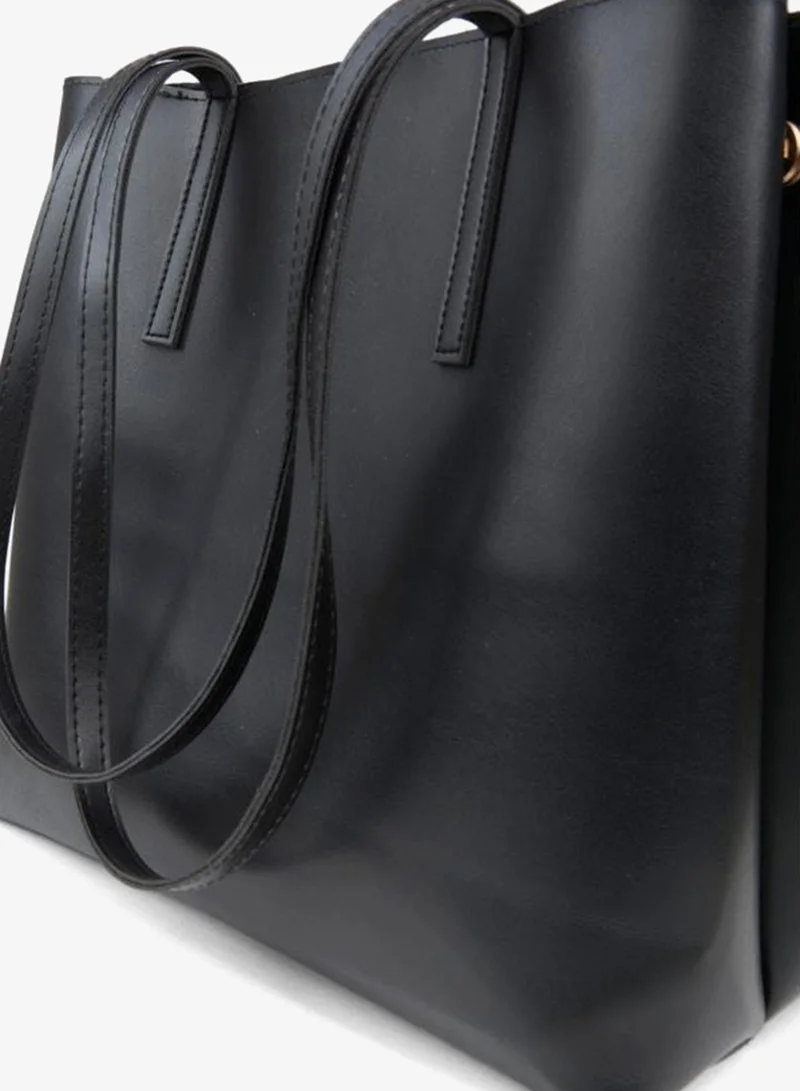 Women's Aster Black Faux Leather Edge Snap‑Fold and Closure Hand, Arm, and Shoulder Bag.