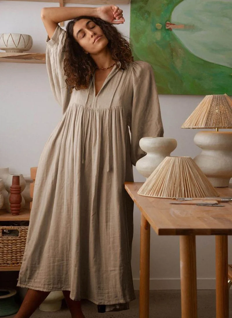 يونيكي Beige Solid Dress