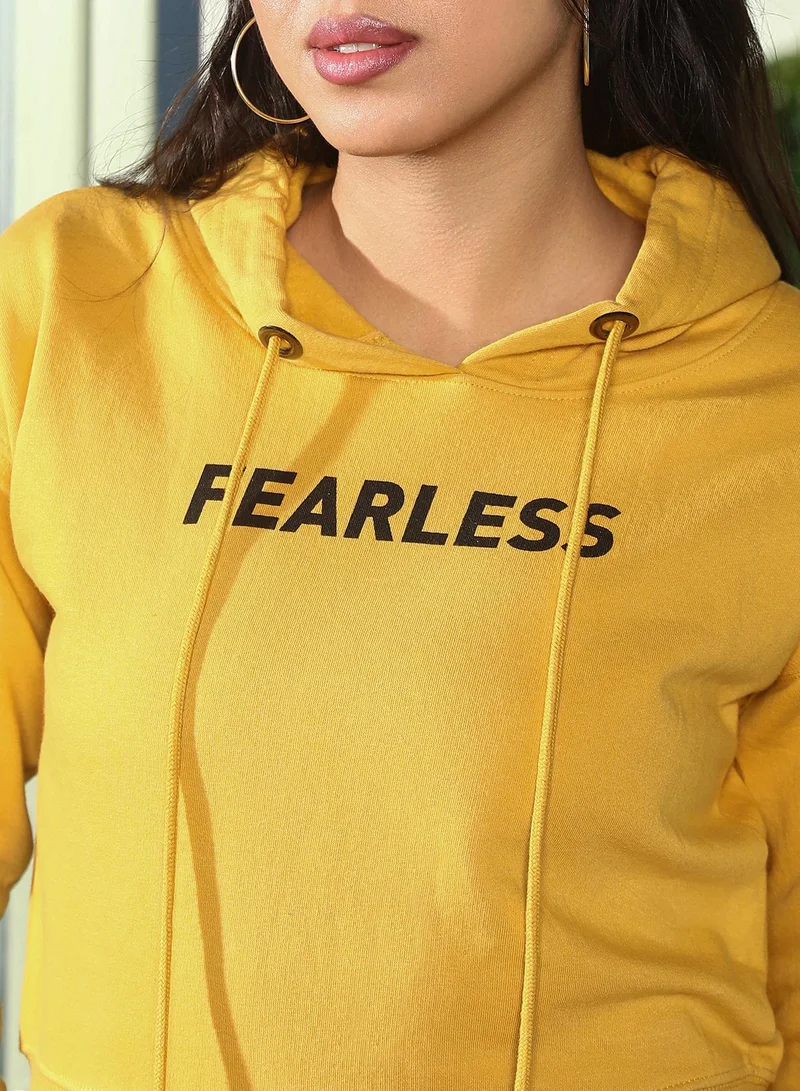 PINACOLADA  Women's Fearless Print Crop Hoodie | Hooded Neck , Long Ribbed-Cuff Sleeves, Pull On Closure | Typographic Print Fleece Knitted Shirt For Casual & Daily Wear | Cadmium Yellow for Women | Best Price UAE