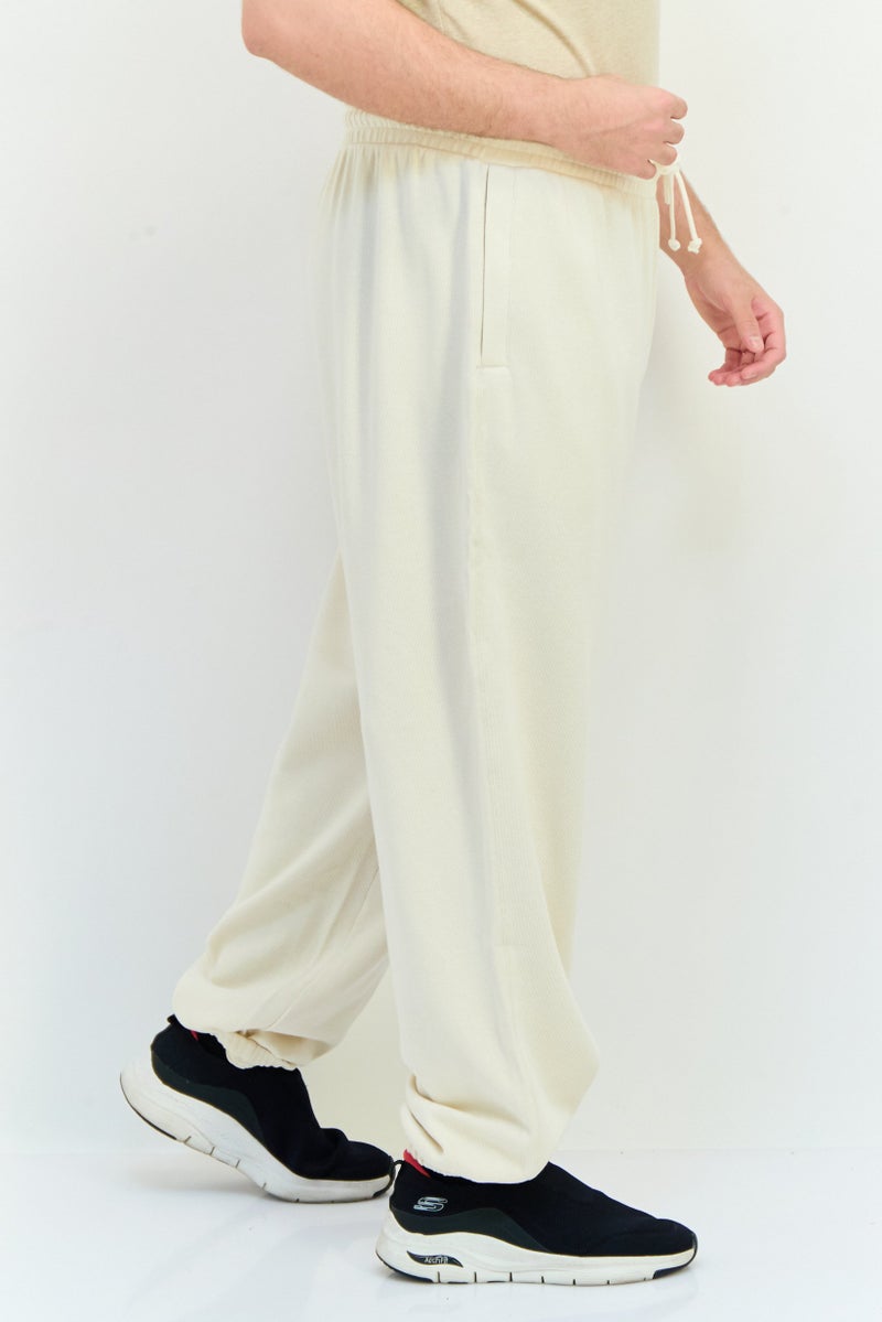 PUMA Men Sportswear Fit Outdoor Sweatpants, Beige - Image 4