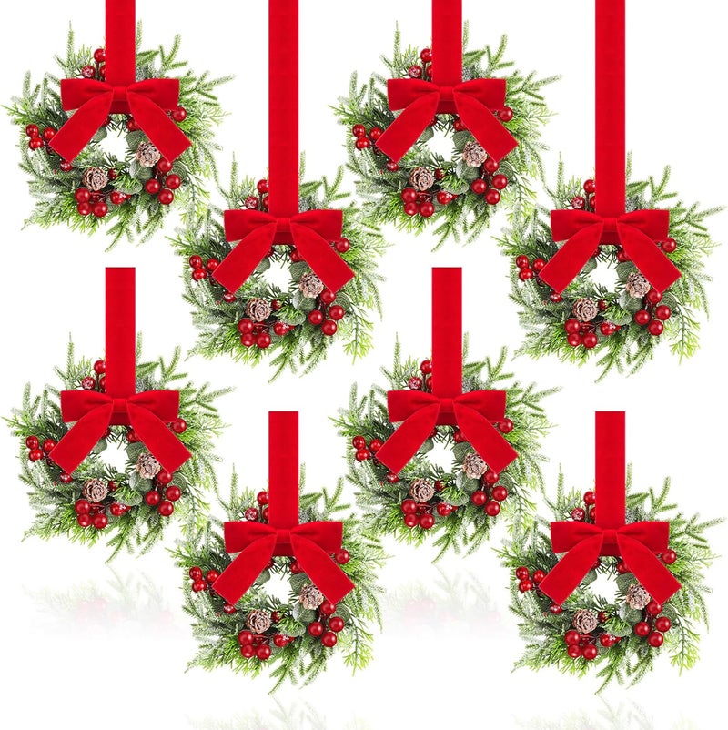 Dingion 8 Pcs Mini Christmas Kitchen Cabinet Wreath Small Christmas Wreath Decorations Norfolk Pine Artificial Berries Snowy Pine Garland with Red Ribbon for Xmas Table Centerpiece Front Door Decor - Image 1