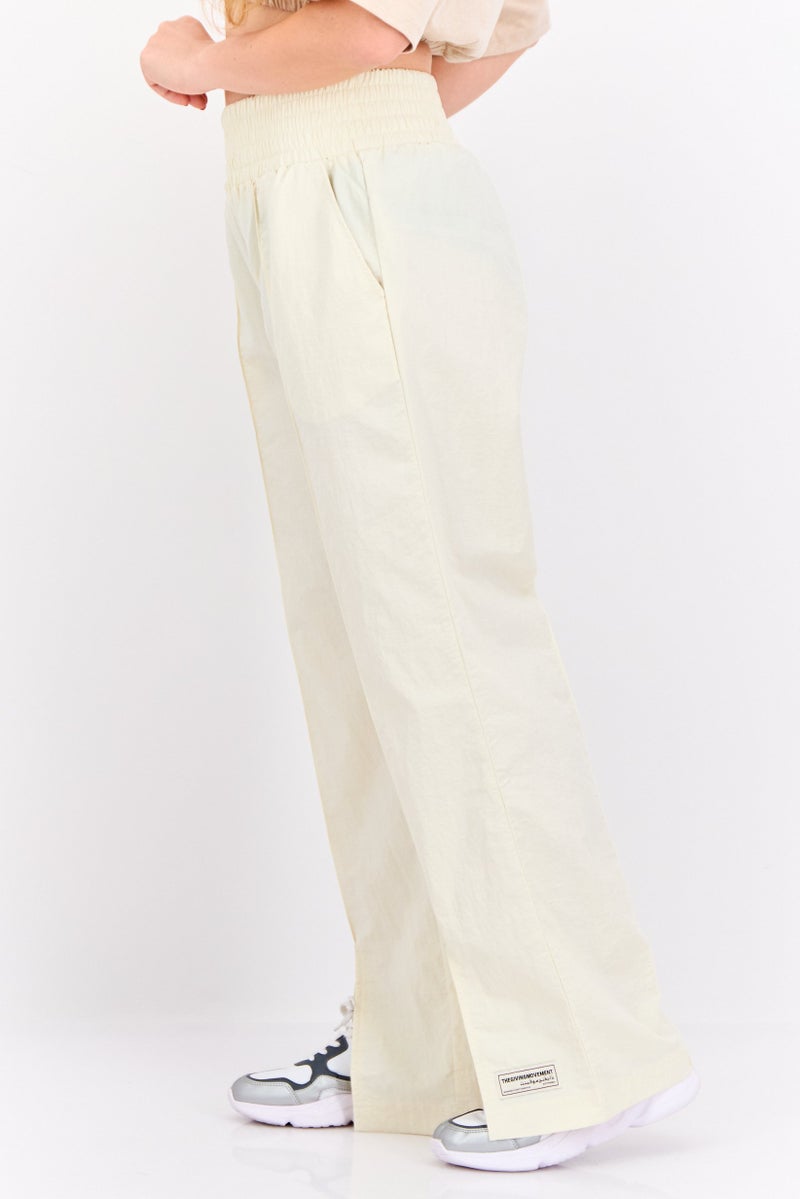 The Giving Movement Women Regular Fit Brand Logo Wide Leg Pants, Cream - Image 1