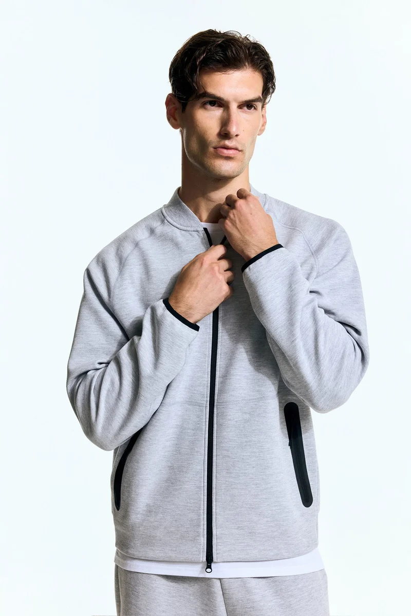 اتش اند ام جاكيت بومبر رياضي من نسيج دراي موف