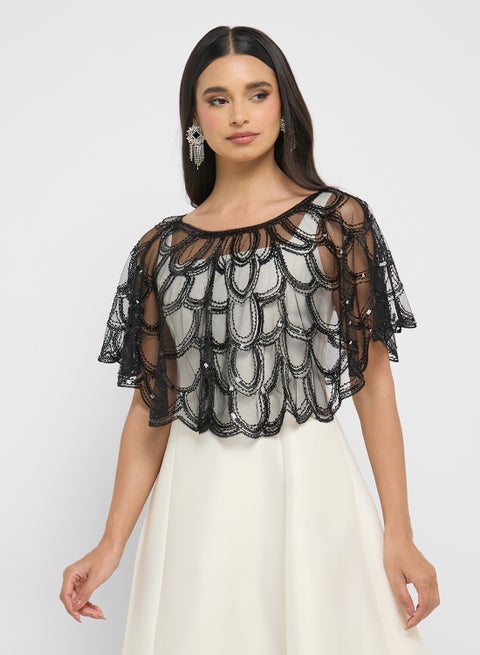 بلوزة شفافة مزينة