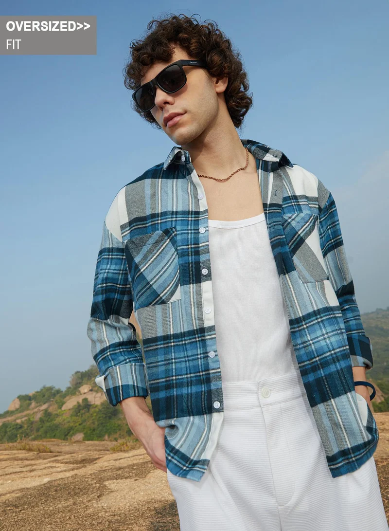 Campus Sutra Campus Sutra Men's Blue & Grey Plaid Utility Oversized Shirt For Casual Wear | Spread Collar | Long Cuffed Sleeves | Button Closure | Oversized Shirt Crafted With Comfort Fit For Everyday Wear