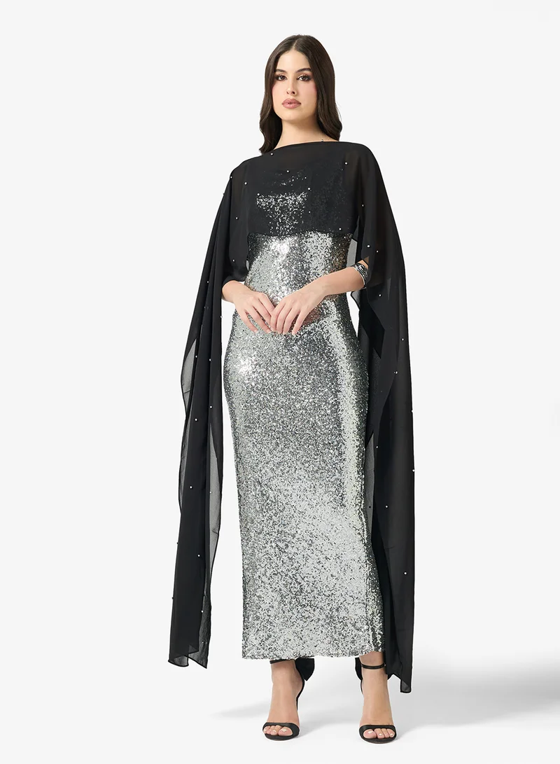 خزانة Shimmer Dress With Exaggrated Cape