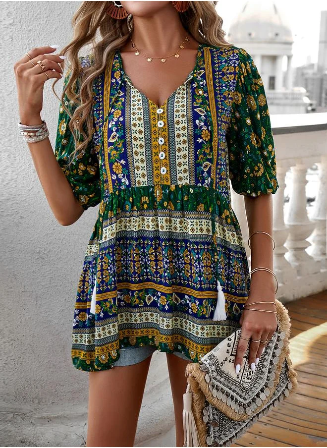ستايلي All Over Print Tassel Tie V Neck Blouse by Styli