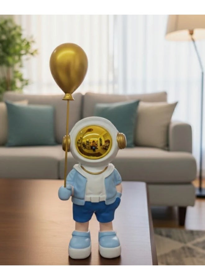 أي كي دي سي ديكور AKDC الخزفي لرائد فضاء يحمل بالونًا، مقاس ٢٠ سم، باللونين الأبيض والأزرق | تمثال فضاء إبداعي للديكورات الداخلية العصرية - Image 2