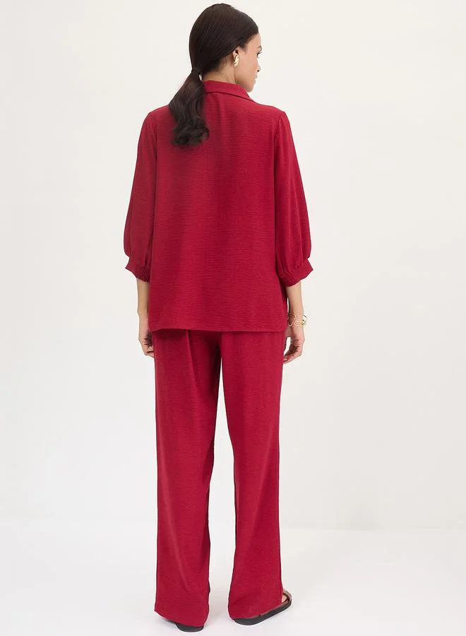 فيميلا طقم منسق من بنطال وبلوزة بياقة وتفاصيل محزوزة