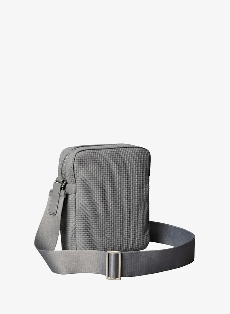 CALVIN KLEIN Embossed Emblem Logo Reporter Bag