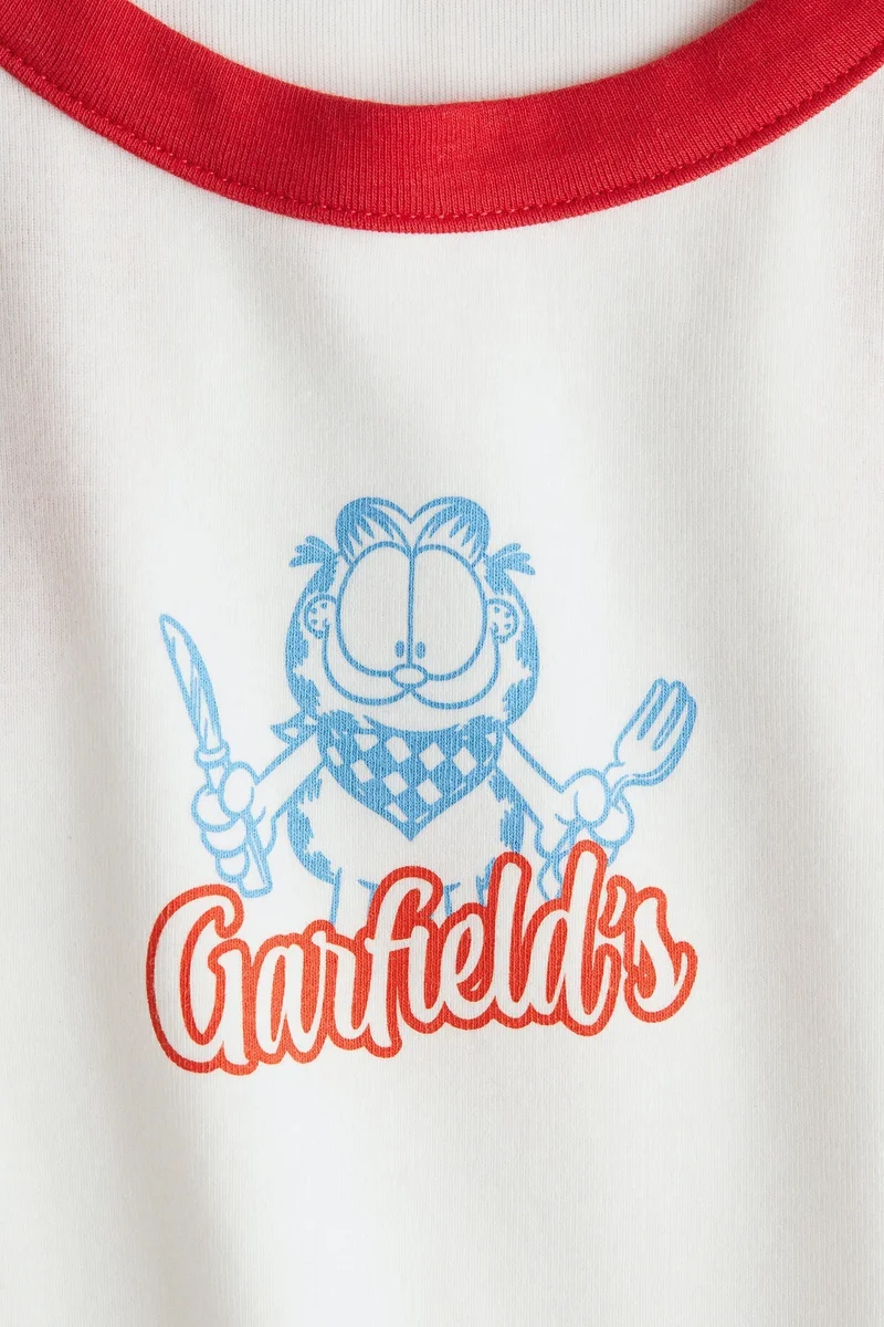 اتش اند ام بلوزة بدون أكمام مطبوعة