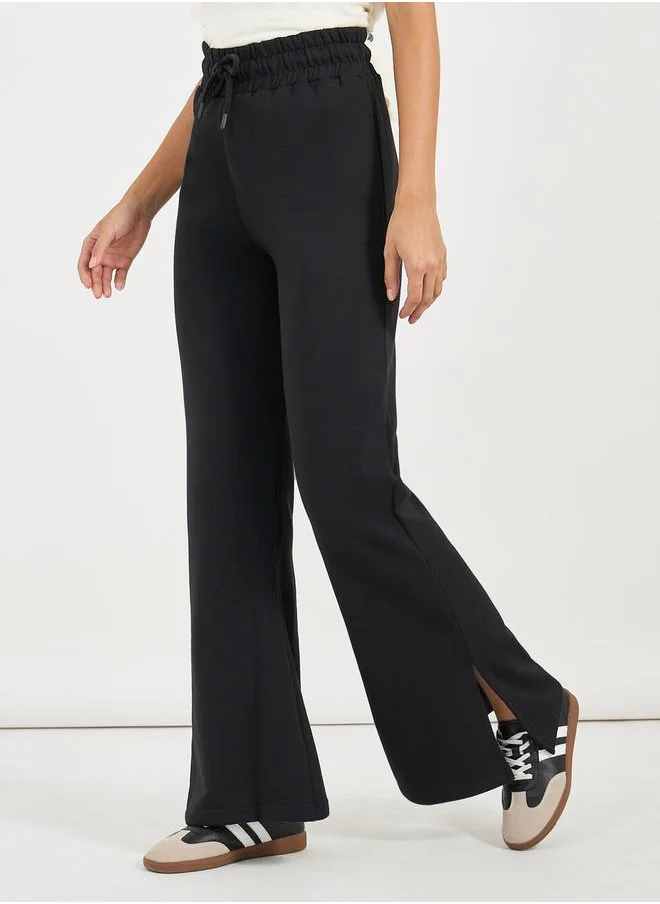 Styli Solid Drawstring Waist Flared Joggers with Side Slit