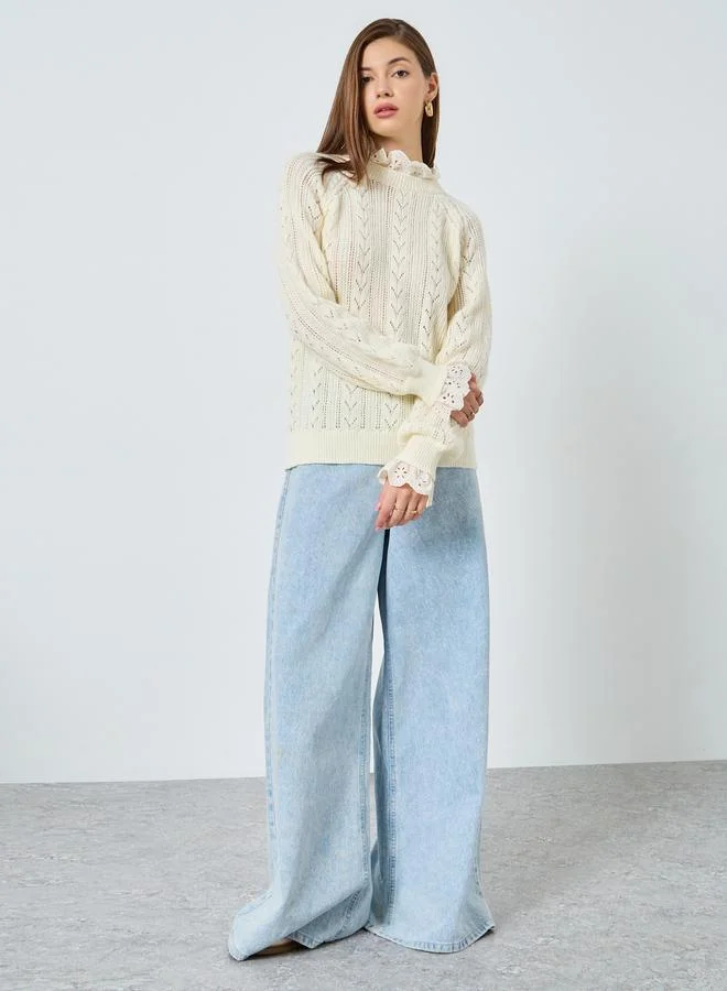 ستايلي سويتر محبوك بقصة عادية وتفاصيل شيفلي بكشكش