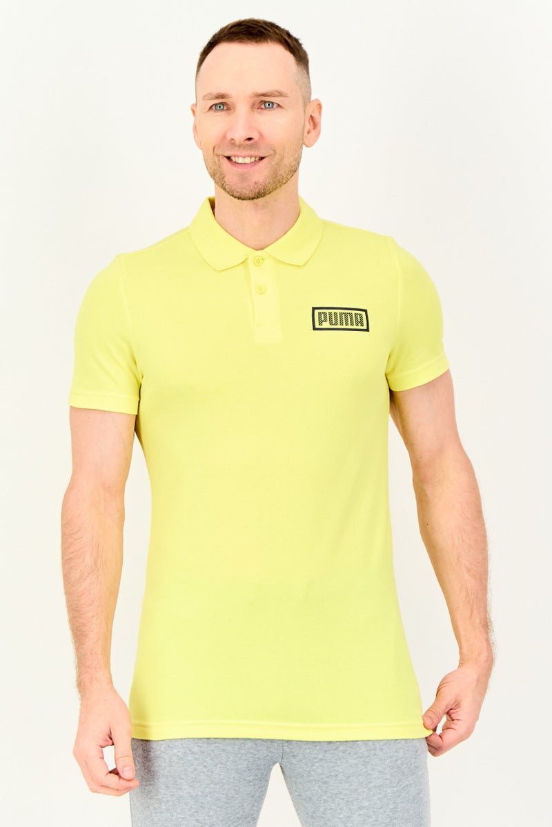 PUMA Men Sportswear Fit Short Sleeve Outdoor Polo Shirt, Bright Yellow - Image 1