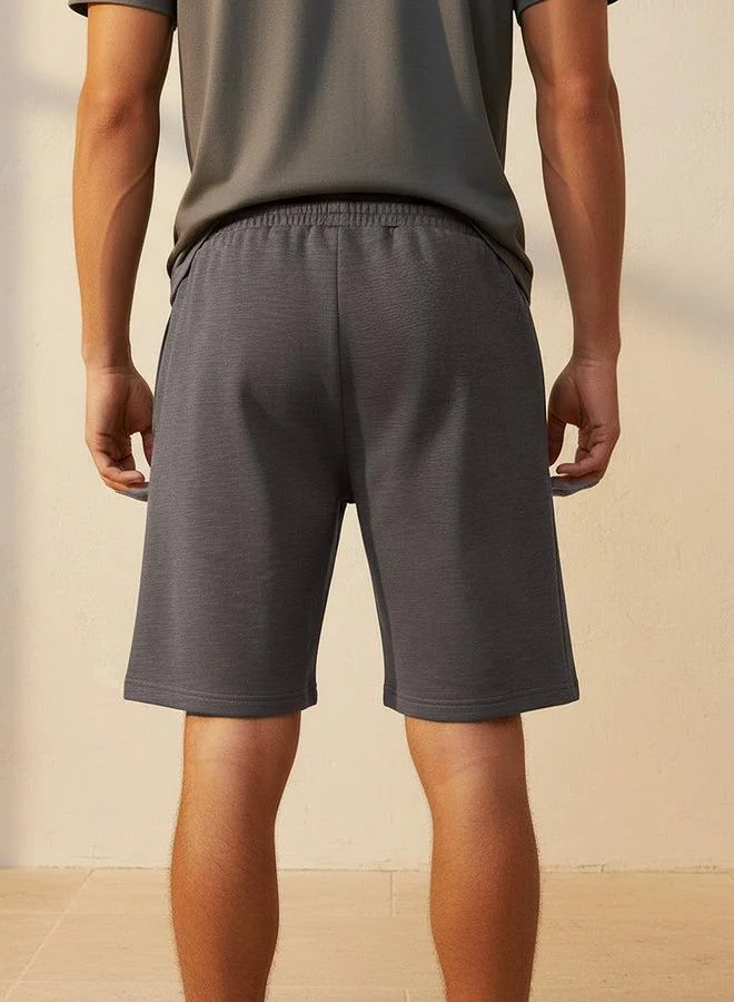 Kappa  Kappa Men Logo Embroidered Shorts for Men | Best Price UAE
