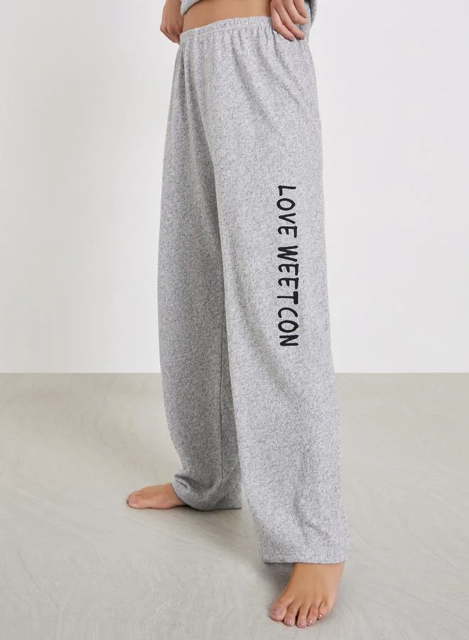 Styli  Solid Striped T-Shirt and Long Pyjama Set for Women | Best Price UAE