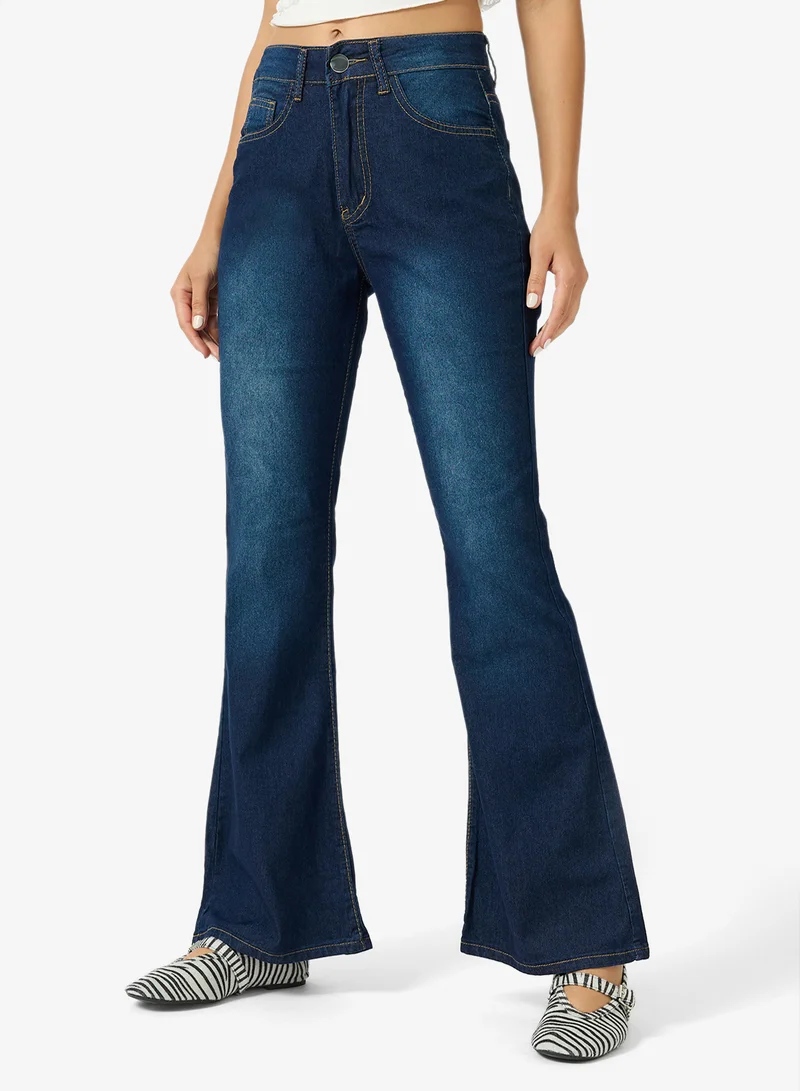 جينجر High Rise Flared Jeans