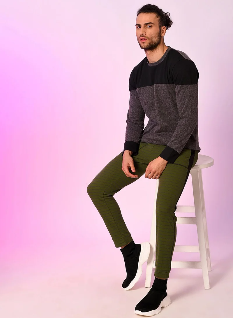 Campus Sutra Campus Sutra Men's Dark Green Striped Trackpants For Casual Wear | Angled Open Pockets | Drawstring Waist | Trackpants Crafted With Comfort Fit & High Performance For Everyday Wear