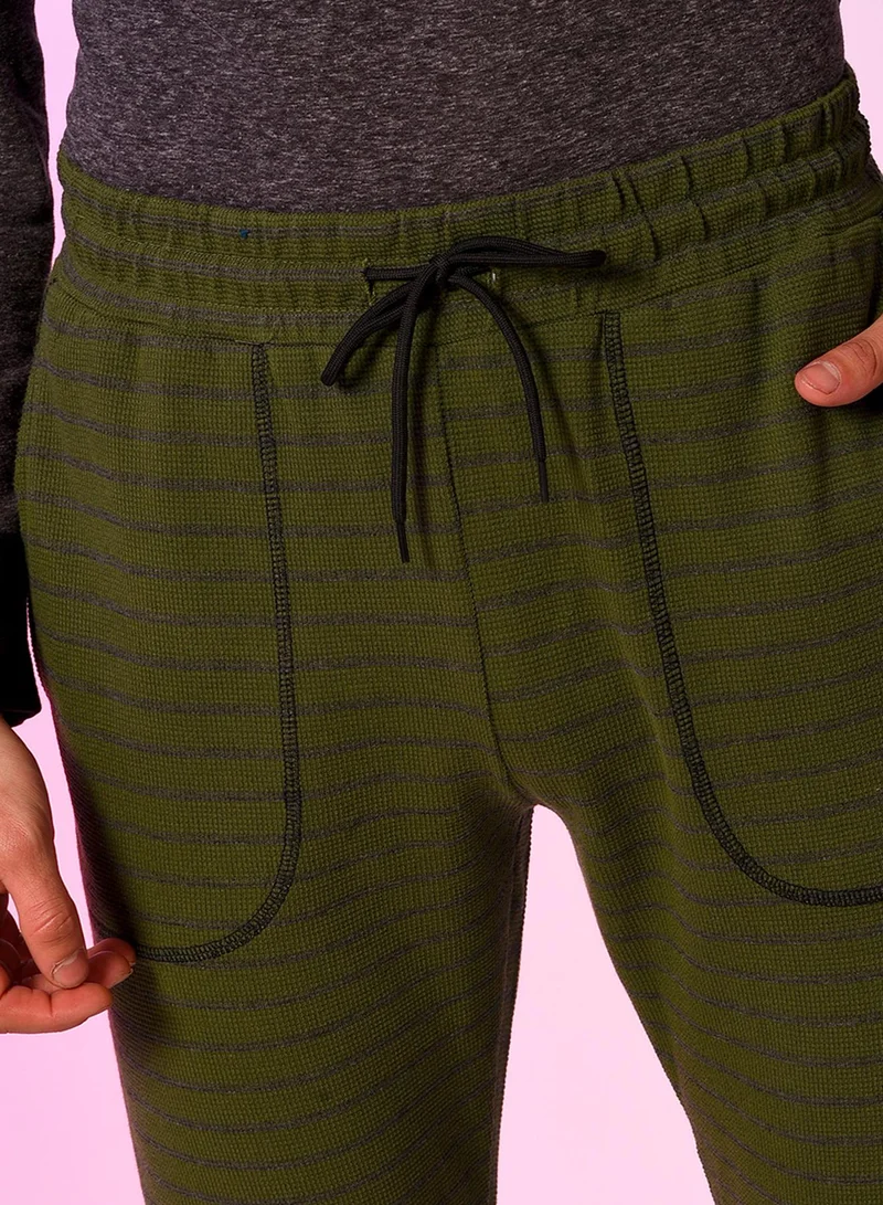 Campus Sutra Campus Sutra Men's Dark Green Striped Trackpants For Casual Wear | Angled Open Pockets | Drawstring Waist | Trackpants Crafted With Comfort Fit & High Performance For Everyday Wear