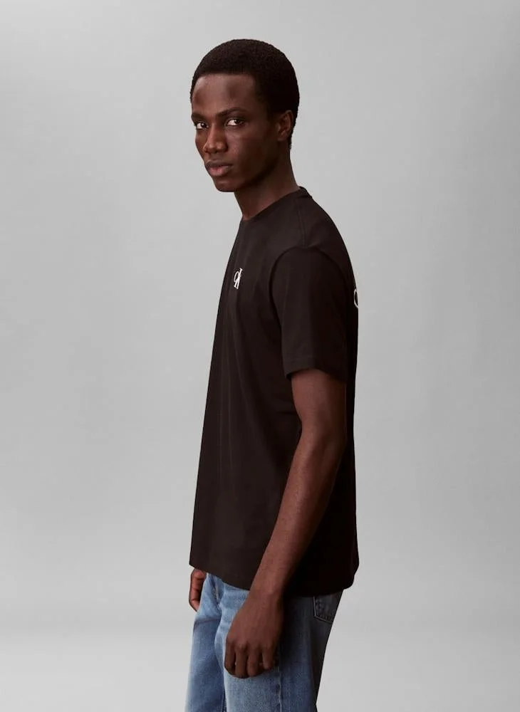 Calvin Klein Jeans  1968 Logo Graphic Crew Neck T-Shirt for Men | Best Price UAE