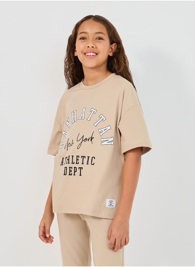 Styli Graphic Print Round Neck T-Shirt & High Rise Pants Co-Ords  - Image 2