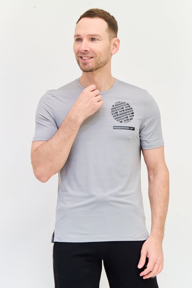 Reebok تي شيرت رياضي للرجال بأكمام قصيرة، رمادي - Image 1