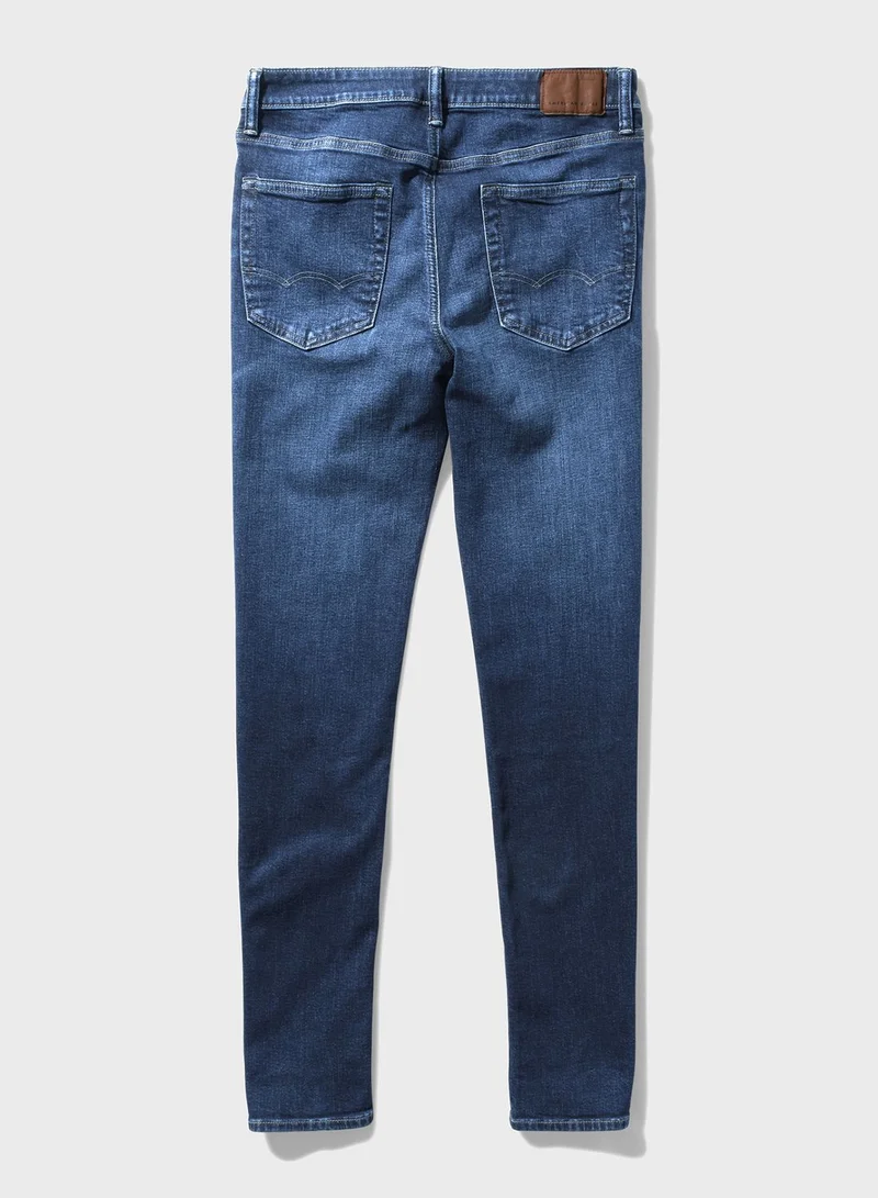 امريكان ايجل Mid Wash Slim Fit Jeans