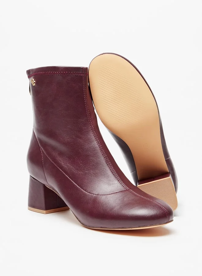 سيليست Women's Solid Ankle Boots with Zip Closure and Block Heels