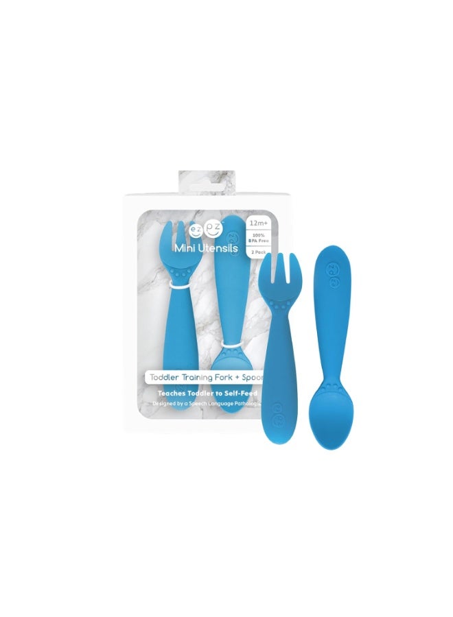 ezpz Mini Utensils - 12 Months+ (Fork & Spoon in Blue) - 100% BPA Free Fork and Spoon - Toddler Utensils - Designed by a Pediatric Feeding Specialist - Image 1