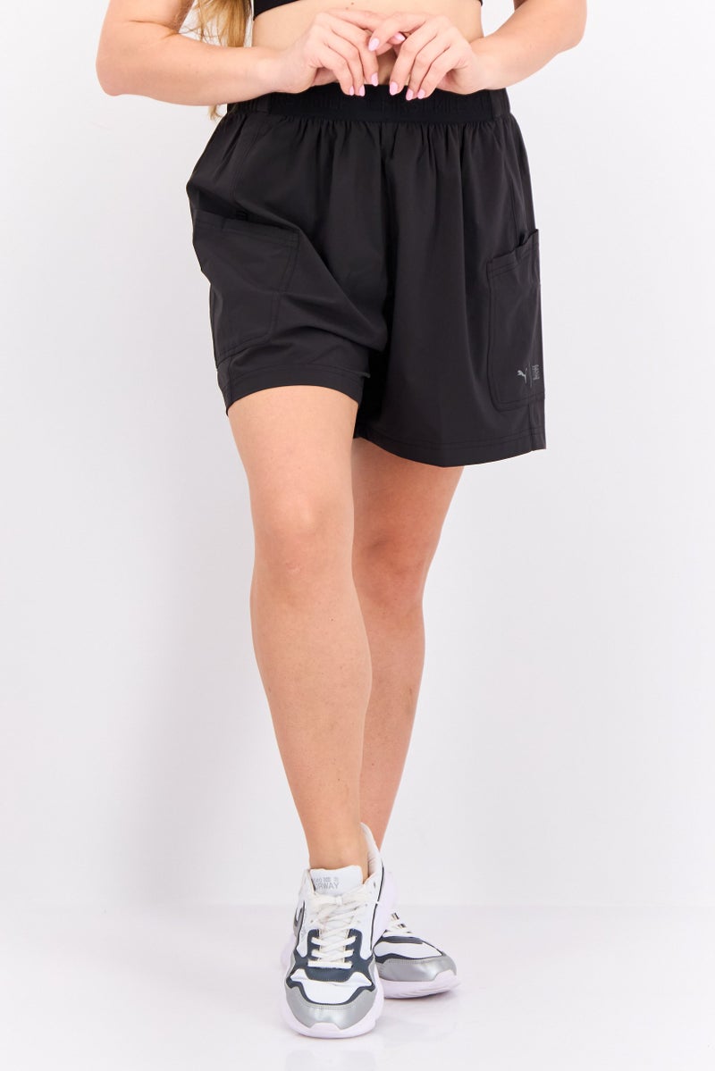 PUMA شورتات تدريب نسائية من بومّا x فيرست مايل بطول 5 إنش، أسود - Image 1