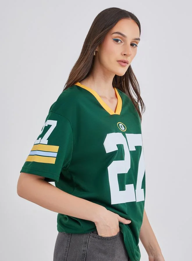 ستايلي تي شيرت نسائي فضفاض بطبعة جرافيك وياقة على شكل  بلون أخضر داكن