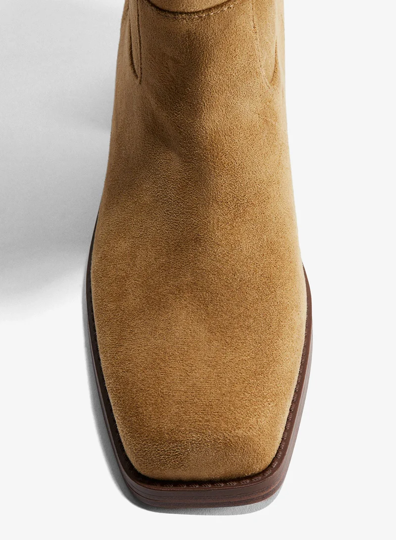 اتش اند ام بووت بايكر بطول الركبة