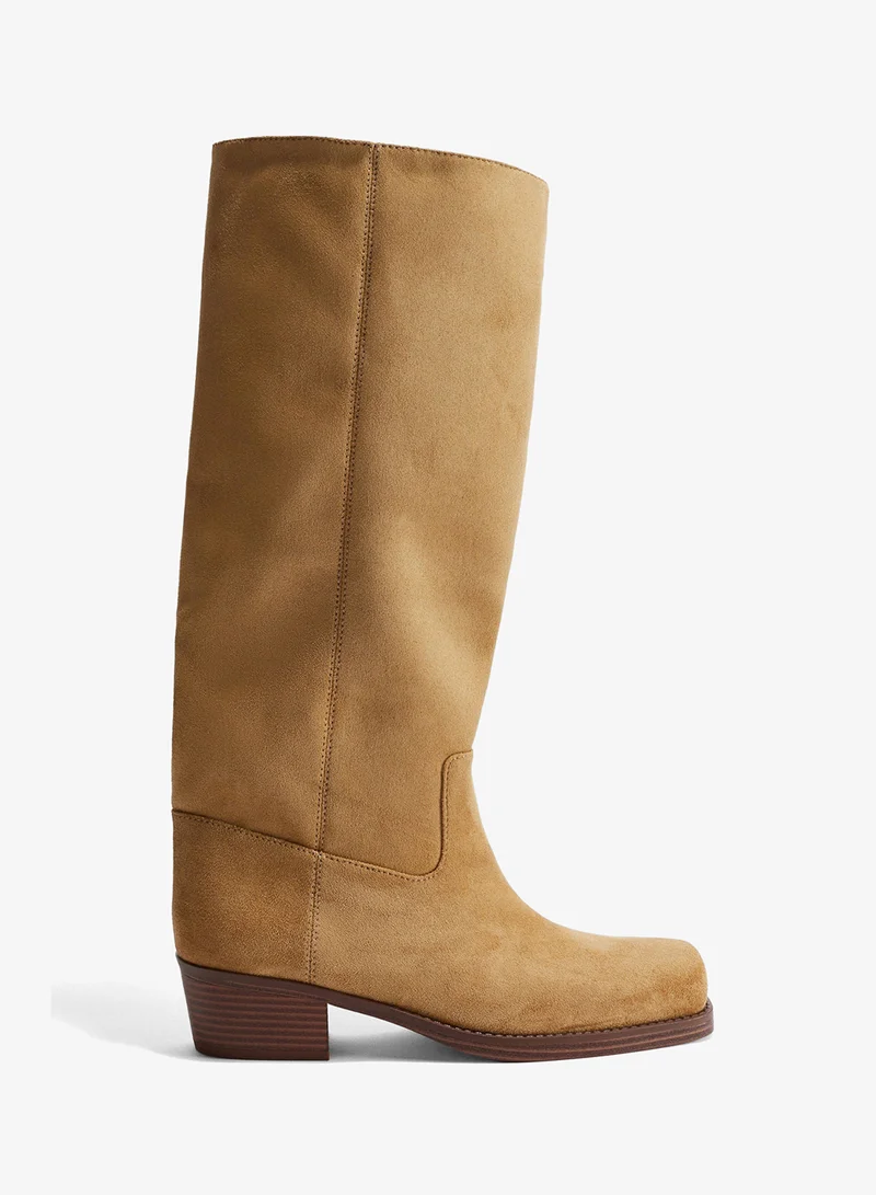 اتش اند ام بووت بايكر بطول الركبة